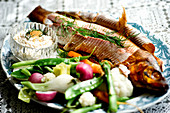 Smoked fish with steamed summer vegetables and sweet potato cream