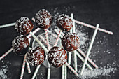 Cheesecake lollies with chocolate glaze and grated coconut