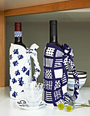 Bottles wrapped in patterned blue-and-white fabric