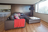 Leather sofa set with ottoman in minimalist interior