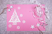 Sweet Christmas tree made of icing, wineglass decorated with icing, icing snowflakes