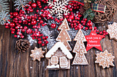 Christmass New Year decorations - Hollly berries, sweet Christmas gingerbread cookies