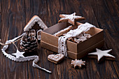 Chtistmas New Year box gift with festive gingerbread cookies and decorations