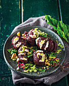 Hasselback beetroot salad with cottage cheese and walnuts