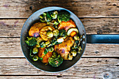 Chicken pan with sprouts, sweet potatoe, broccoli and ginger