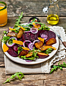 Autumn salad with beetroot and plums