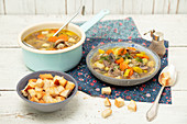 Veggie and mushroom soup with croutons