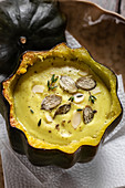 Vegan cream soup in an acorn squash