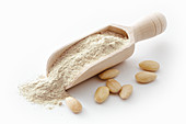 Almond flour in a wooden scoop