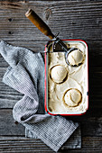 Homemade maple sugar ice cream on a wooden background