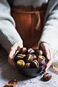Roasted chestnuts in a bowl