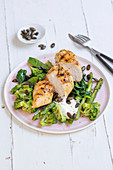 Roasted chicken breast with green vegetables