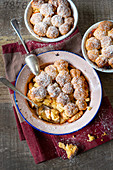 Apple cobbler with icing sugar