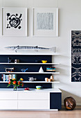 Decoration on a white shelf with a black back wall in the living room