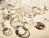 Empty glasses on a yellow background