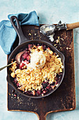 Gin and berry pear crumble with quick maple macadamia ice-cream