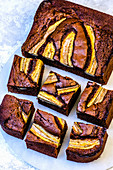 Sliced ​​into square pieces of brownie with chocolate and banana