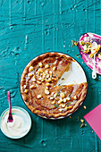 Salted maple custard pie with rosemary and macadamia
