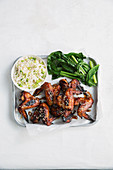 Sticky chicken wings with miso, ginger, paksoi and rice