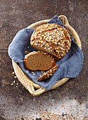 Bread baked in a cast iron pot with malt syrup and oats