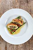 Corn-fed chicken breast with a mushroom filling, asparagus and tomato butter