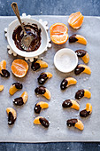 Mandarin segments dipped in salted chocolate
