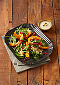 Couscous salad with baked pumpkin and yoghurt sauce