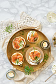 Blinis with salmon and cream cheese and capers