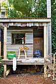 Playhouse made from recycled wood in the garden