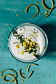 Lemon cream with lemon peel and basil