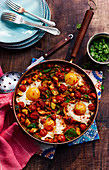 Pan fried veg with chickpeas and fried eggs (Morocco)