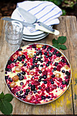 Summer berry cake with sour cream for a picnic or beer garden