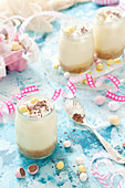 White Chocolate Creamy Dessert with Mini Chocolate Eggs for Easter
