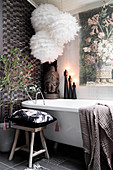 Lavishly decorated grey bathroom in romantic Bohemian style