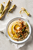 Chickpea hummus dip with basil breadsticks