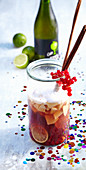 Apple punch with redcurrants, calvados and cider