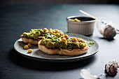 Grilled bread with a baked chickpea spread (vegan)