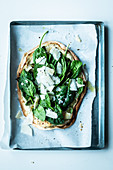 Tarte flambée with spinach and Parmesan