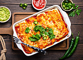 Traditional Mexican enchiladas with meat, chili red sauce and cheese