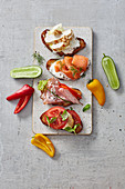Healthy canapés with chicken, salmon and vegetables