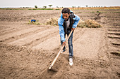 Worker tilling the ground, Meki Batu, Ethiopia