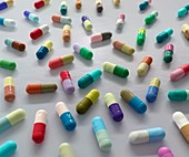 Colour-coded medical capsules, illustration