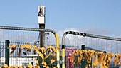 Anti-fracking ribbons on fence