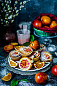 Muffins with slices of red orange