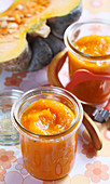 Autumnal pumpkin ketchup in a jar with curry, orange, vinegar, harissa and cinnamon