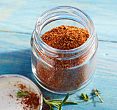 Homemade rub spice mix in a glass for grilling