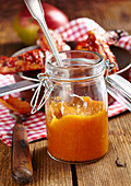 Homemade mango ketchup served as a dip with chicken wings