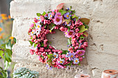 Wreath of pomegranate cones and asters