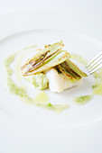 Sea bass on pureed and fried young fennel