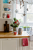 Christmas decorations in country-house kitchen